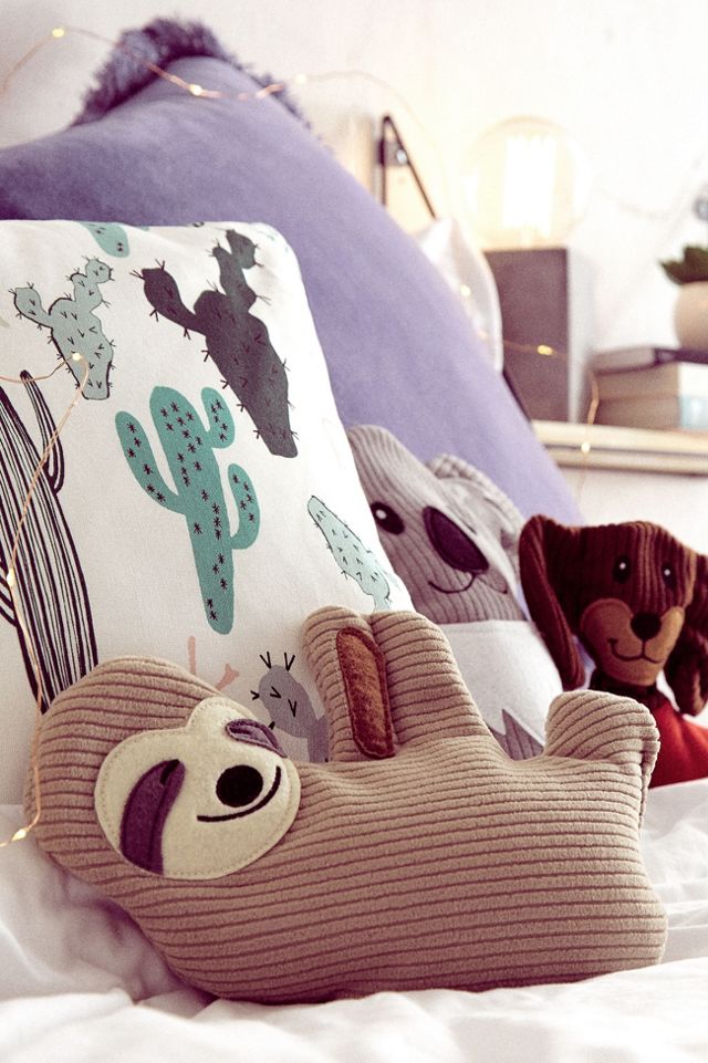 Huggable HeatUp Sloth Cushion Urban Outfitters UK