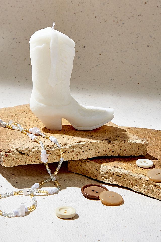 urbanoutfitters.com | emone Cream Cowboy Boot Candle