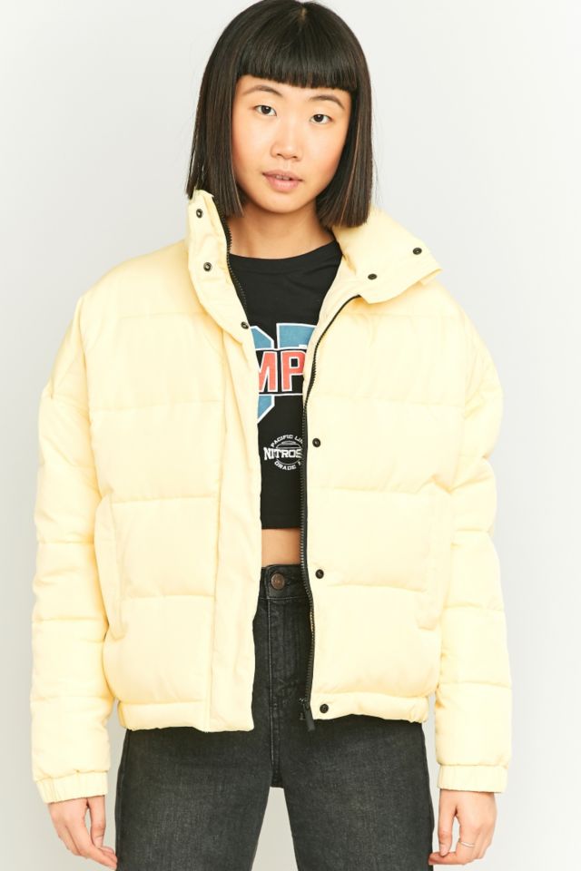 Light yellow shop puffer jacket