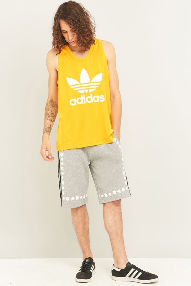 adidas Originals Débardeur à logo trèfle jaune Urban Outfitters FR