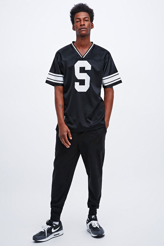 Stussy All City Mesh Football Jersey in Black | Urban Outfitters UK