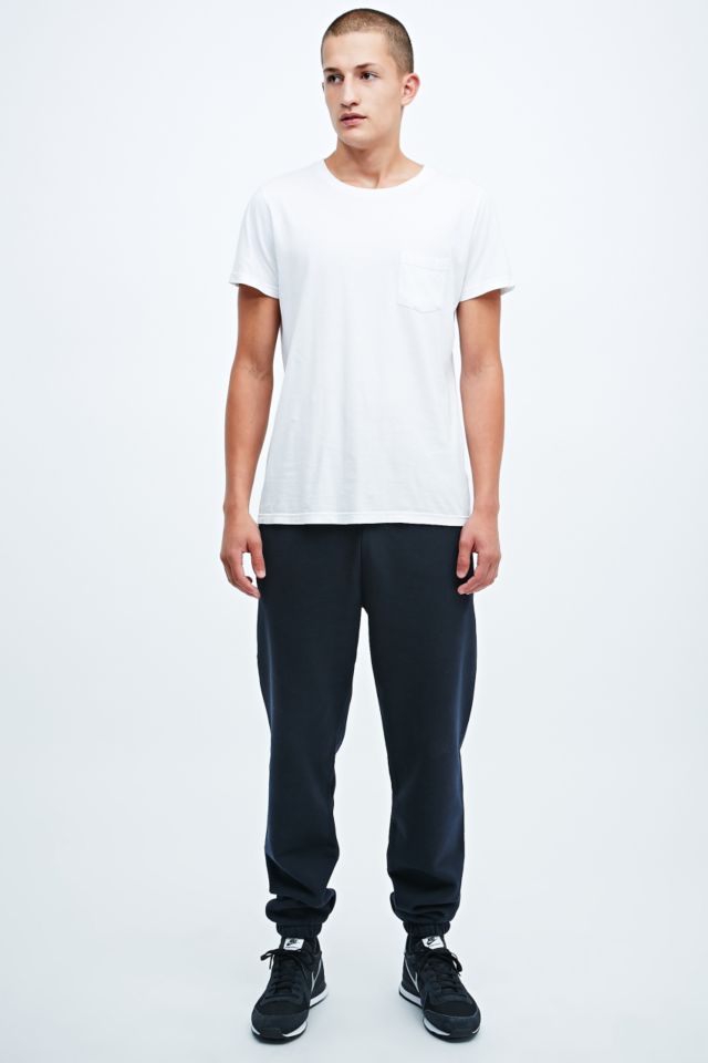 Carhartt Chase Joggers in Navy | Urban Outfitters UK