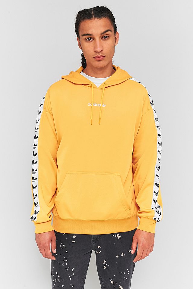 maksimere svinekød flåde adidas TNT Yellow and White Taped Hoodie | Urban Outfitters UK