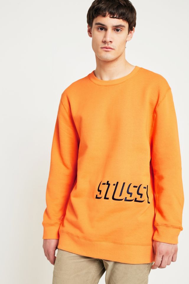 Stussy store orange sweatshirt