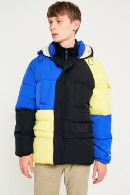 yellow and black puffer coat