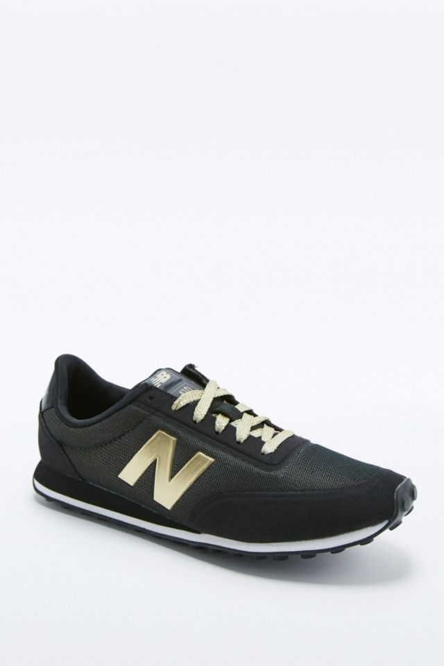 Dokter Explosieven Genealogie New Balance 410 Black and Gold Trainers | Urban Outfitters UK