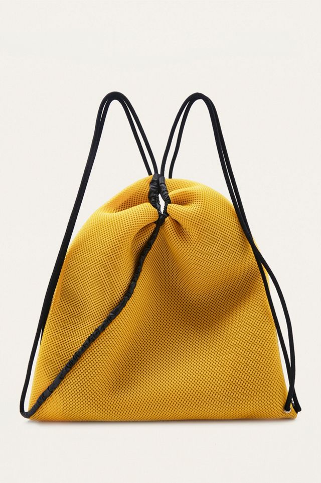 MM6 Mustard Netted Drawstring Backpack | Urban Outfitters UK