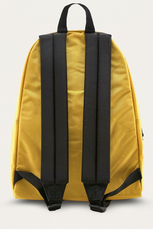 Eastpak Padded Pak'R Flexible Yellow Backpack | Urban Outfitters UK