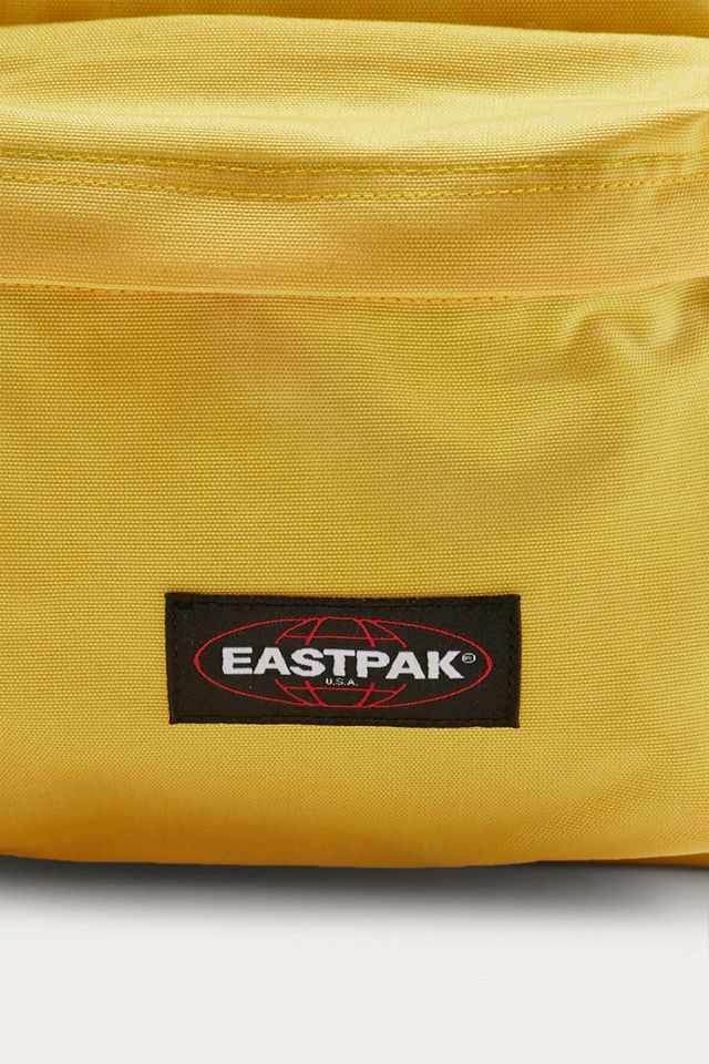 Eastpak Padded Pak'R Flexible Yellow Backpack | Urban Outfitters UK