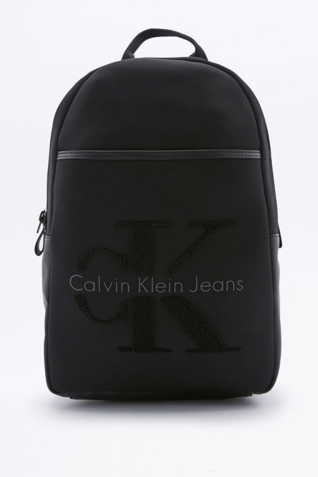 voor mij potlood seksueel Calvin Klein RE-ISSUE 2.0 Black Neoprene Backpack | Urban Outfitters UK