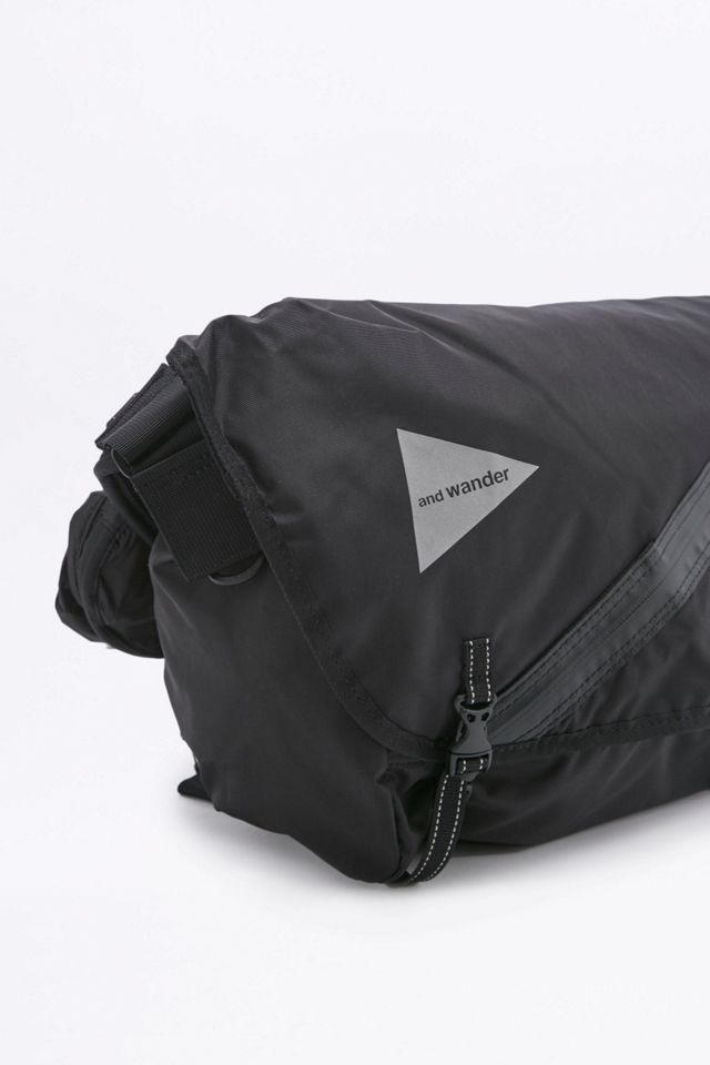 and wander 20L Black Messenger Bag | Urban Outfitters UK